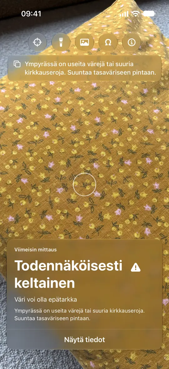 Kuviollinen keltainen kangas: Opsino näyttää ”Todennäköisesti keltainen” ja varoituksen sekoittuneista väreistä.